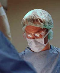 Picture of male physician during surgery