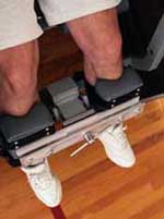 Picture of a man using equipment during a physical therapy session