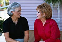 Picture of two women sitting having a conversation