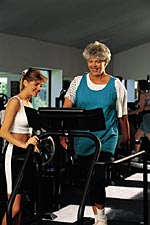 A picture of a woman on a treadmill