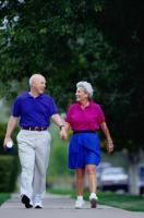 Picture of a middle-aged couple walking on a sidewalk