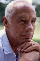 Picture of an older man with serious expression on his face